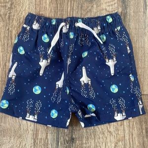 Hanna Andersson swim trunks with spaceships size 18 to 24 months